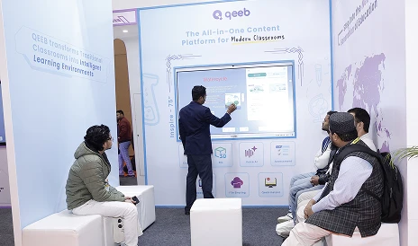 Visitors gathered around COLTEC interactive flat panel during live demo