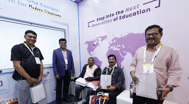 COLTEC team member presenting token of appreciation to partner