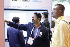 Small group of teachers exploring whiteboarding tools on COLTEC panel