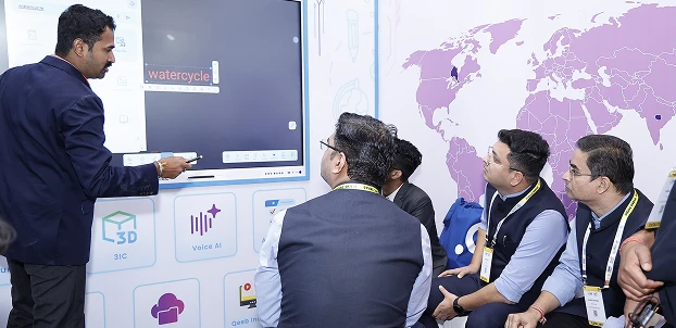 Coltec showcasing Rise 75'' Interactive Flat Panel and Inertia Series 1.25mm LED display for advanced classroom and corporate applications.