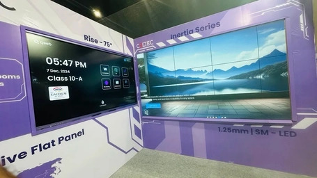 Coltec showcasing Rise 75'' Interactive Flat Panel and Inertia Series 1.25mm LED display for advanced classroom and corporate applications.