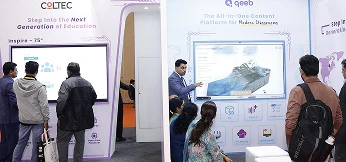 Teacher reviewing Qeeb analytics dashboard during demo