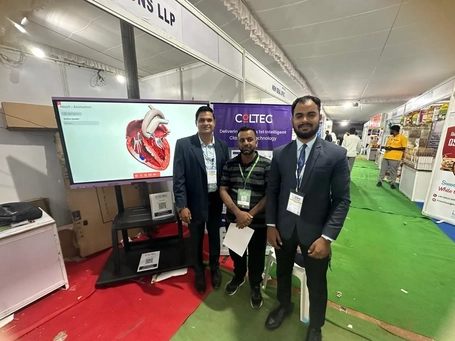 Coltec team presenting the revolutionary Interactive Flat Panel technology at Rifaa Expo 2024, demonstrating its applications in education and healthcare with an engaging anatomical display.