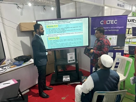 Coltec team showcasing the advanced features of their Interactive Flat Panel at Rifaa Expo 2024, engaging visitors with live demonstrations of cutting-edge educational and business solutions.
